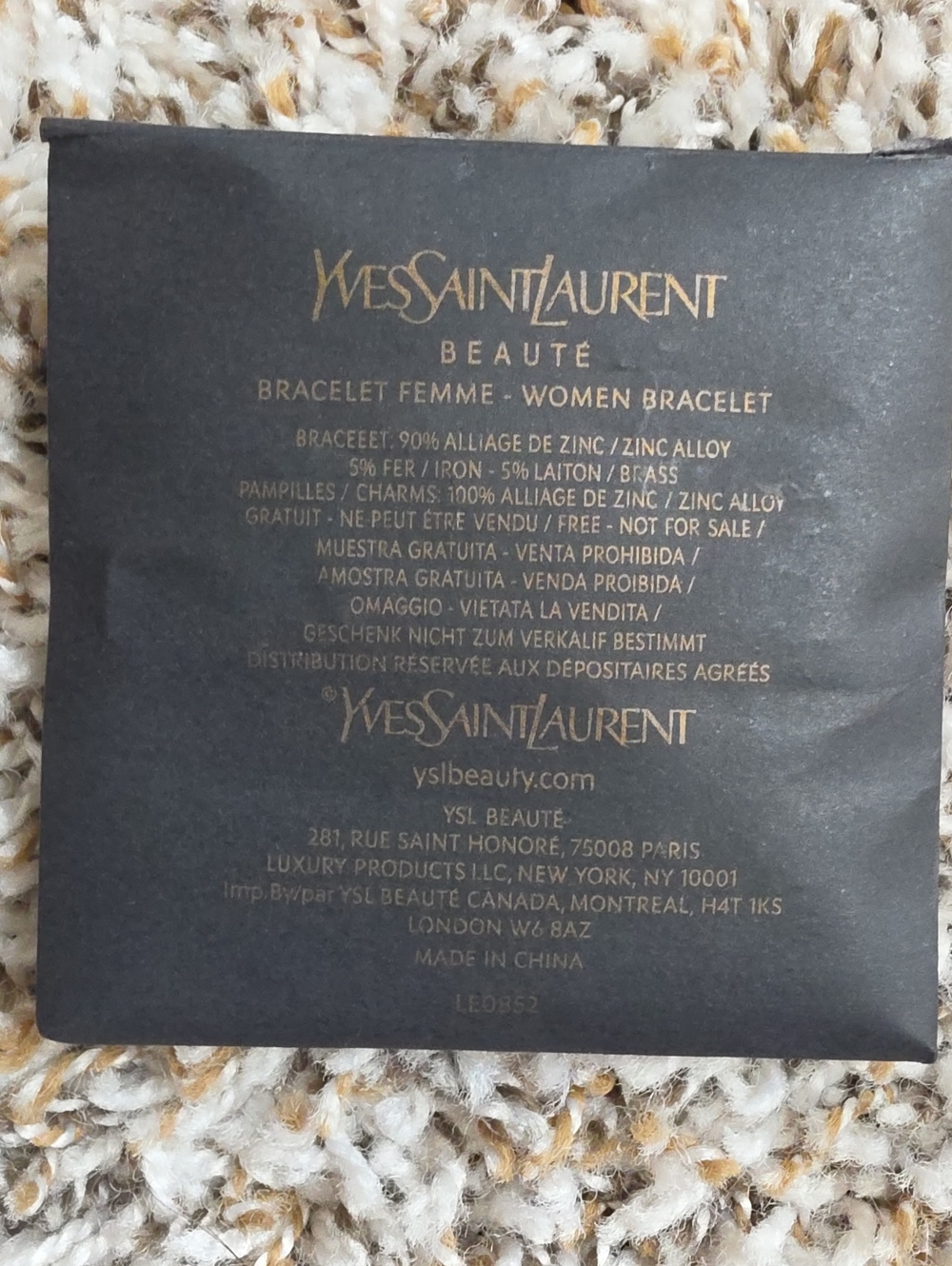 Yves Saint Laurent Black and Gold Women's Bracelet Packaging